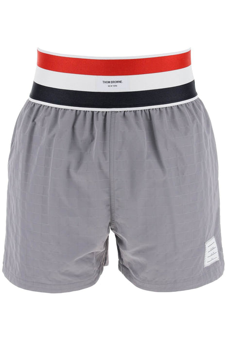 THOM BROWNE nylon bermuda shorts with elastic band in red