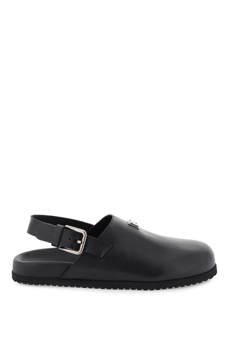 DOLCE & GABBANA leather clogs with logo plate