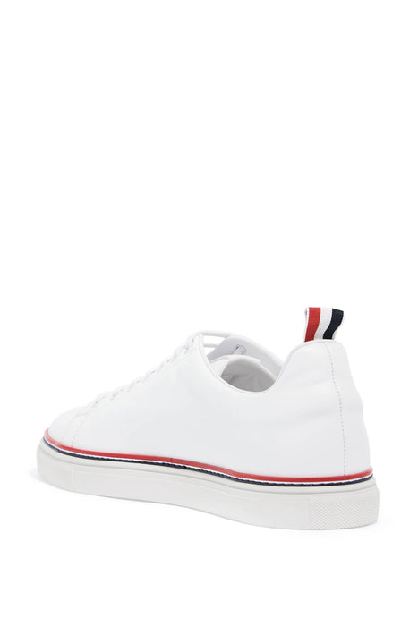 THOM BROWNE smooth leather sneakers with tricolor detail.
