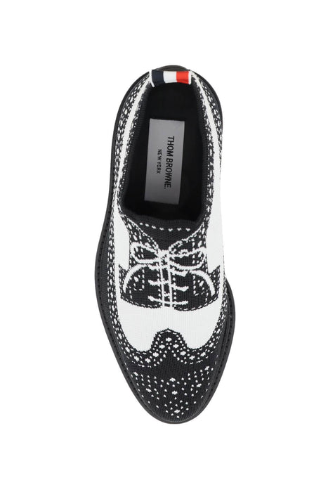 THOM BROWNE longwing brogue loafers in trompe l'oeil knit