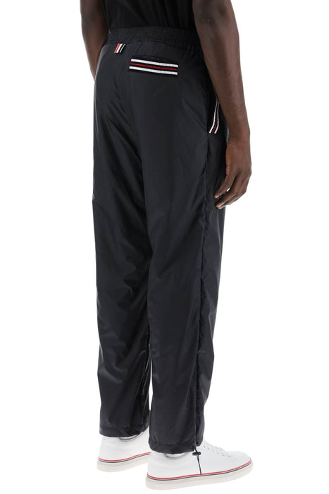 THOM BROWNE cricket stripe ripstop pants for